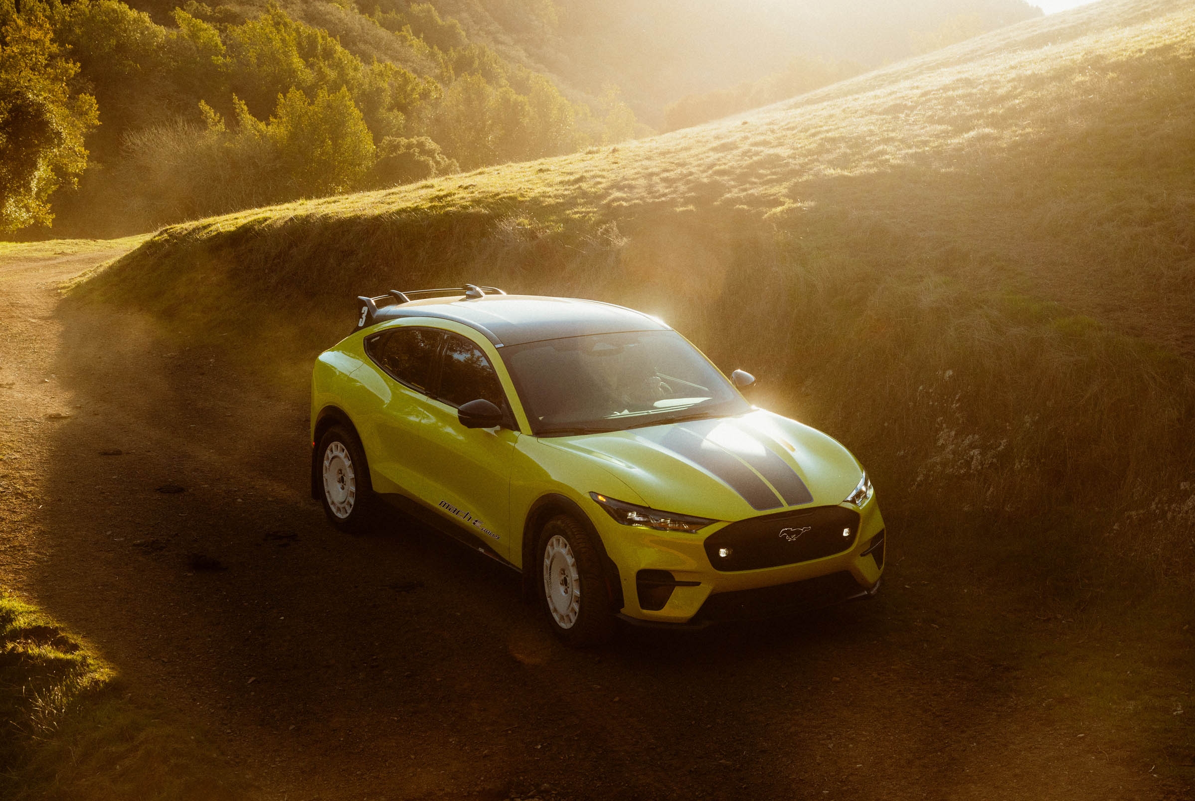 Sophie's Mustang Mach-E Rally taking on a dirt path