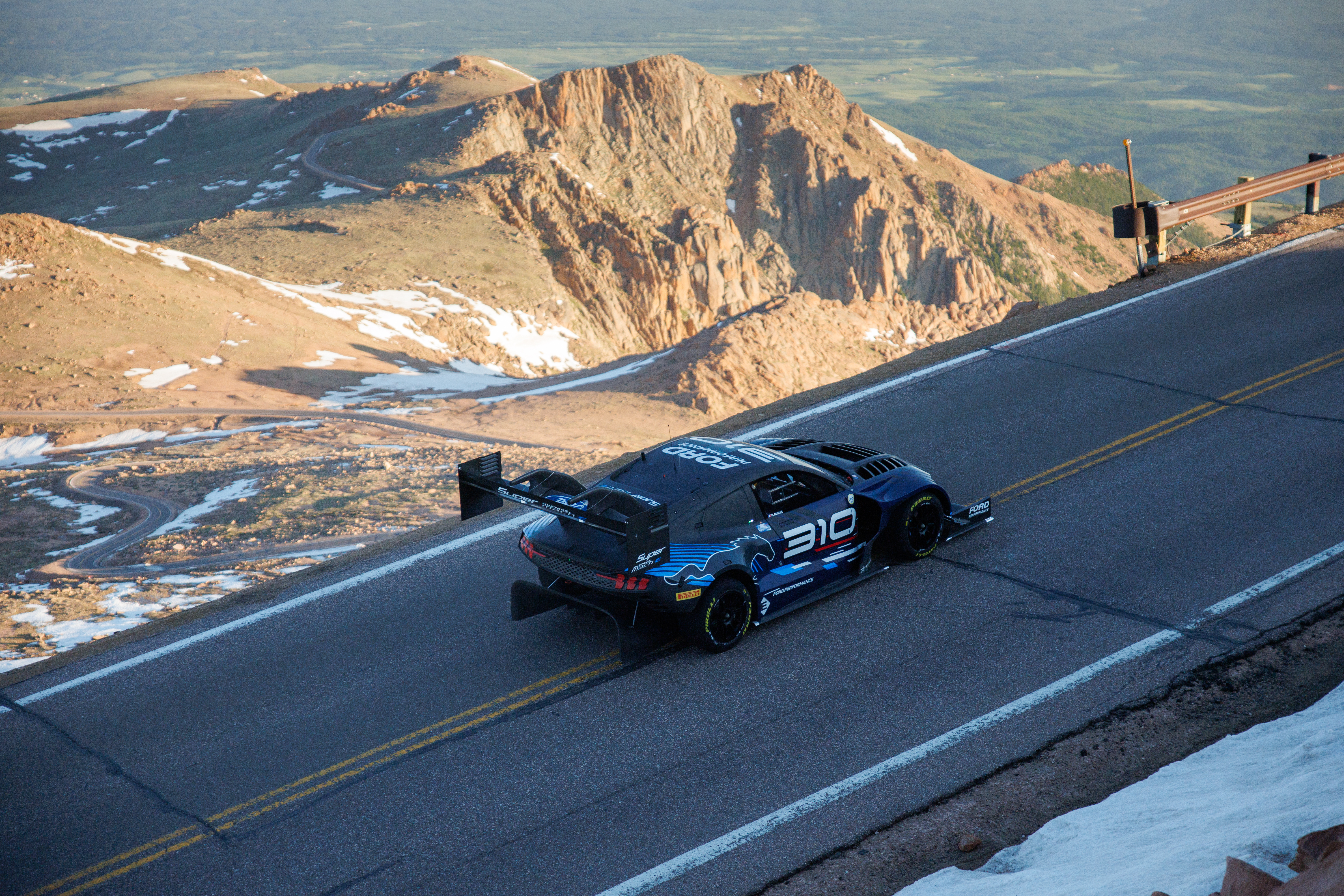 Super Mustang Mach-E electric demonstrator ascending Pikes Peak.