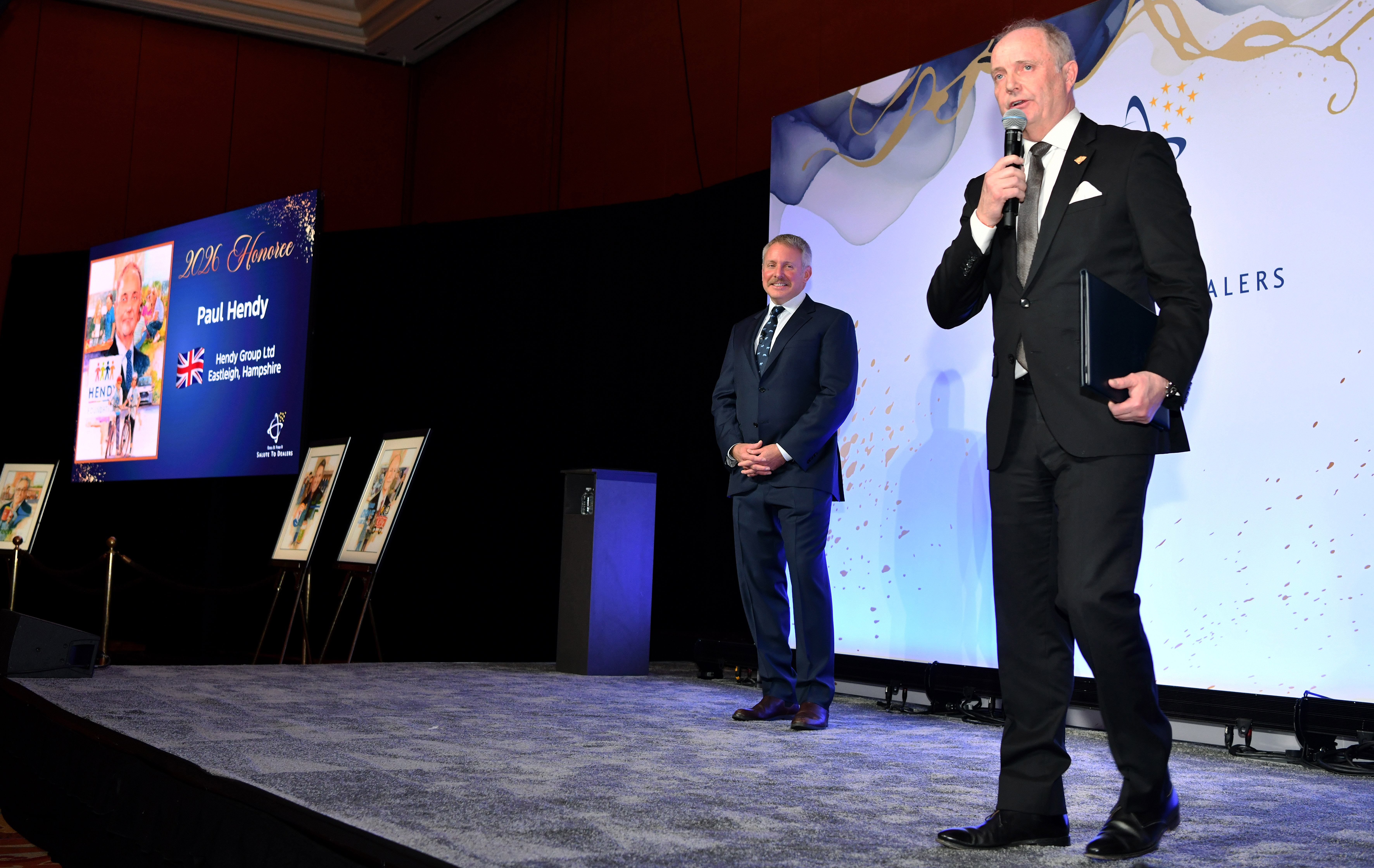 LAS VEGAS,  Feb. 3, 2026 — Henry Ford III recognized the Ford Motor Company 2026 Salute to Dealers honorees at a reception on Feb. 3 in Las Vegas. For the past 26 years, Salute to Dealers, has recognized Dealer Principals who have made an extraordinary commitment to helping their communities through their support of countless charitable and philanthropic causes. This year, eight dealers were honored. Pictured: Henry Ford III and Paul Hendy.Photo by: Sam VarnHagen