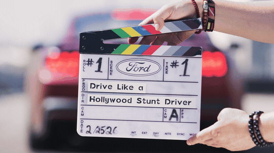 Ford recently asked Dee Bryant to spend some time teaching a few eager drivers what it takes to be a Hollywood stunt driver using a brand-new Mustang Dark Horse.