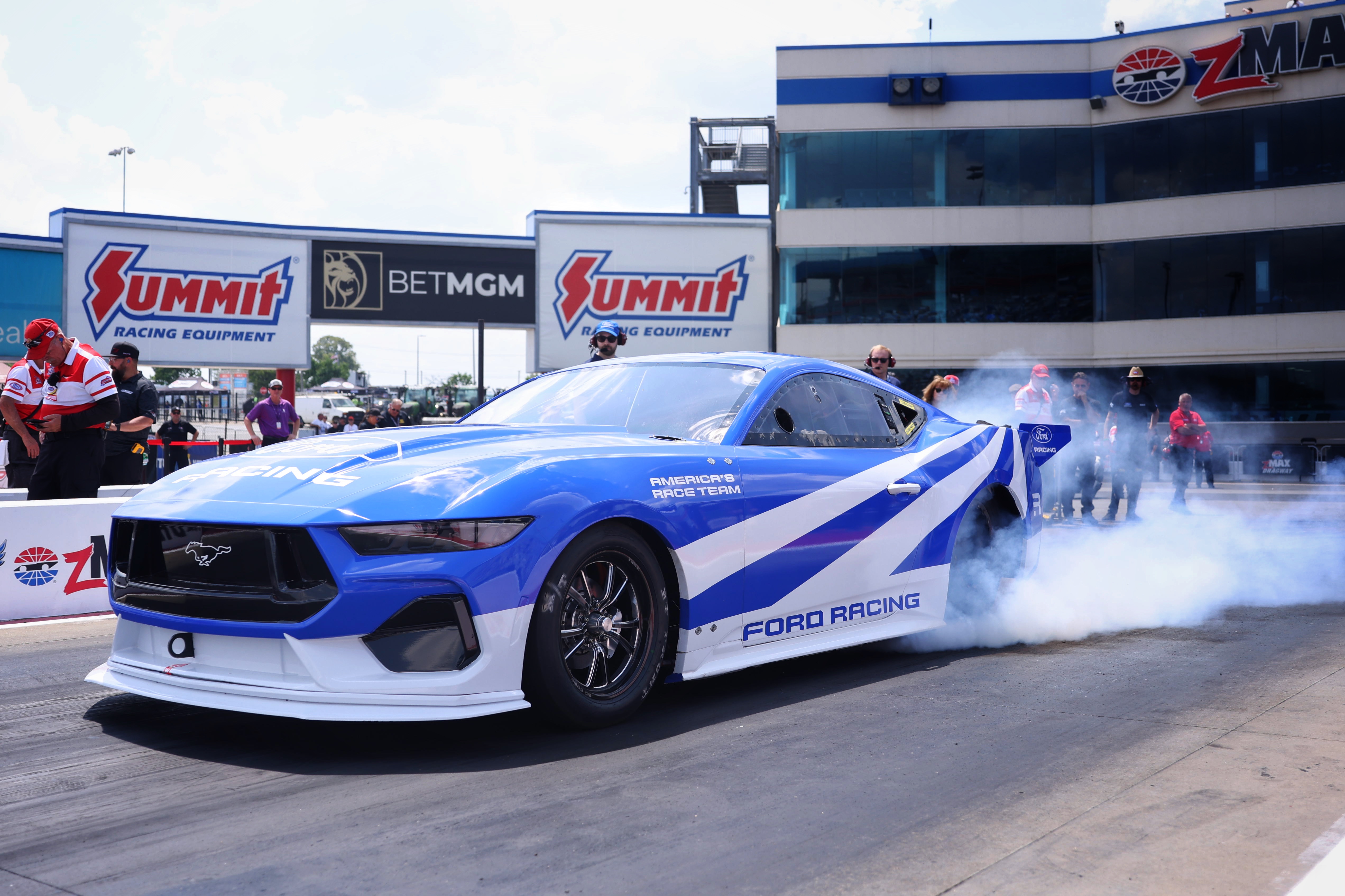 Ford Racing Mustang Cobra Jet 2200 does a burnout before a pass