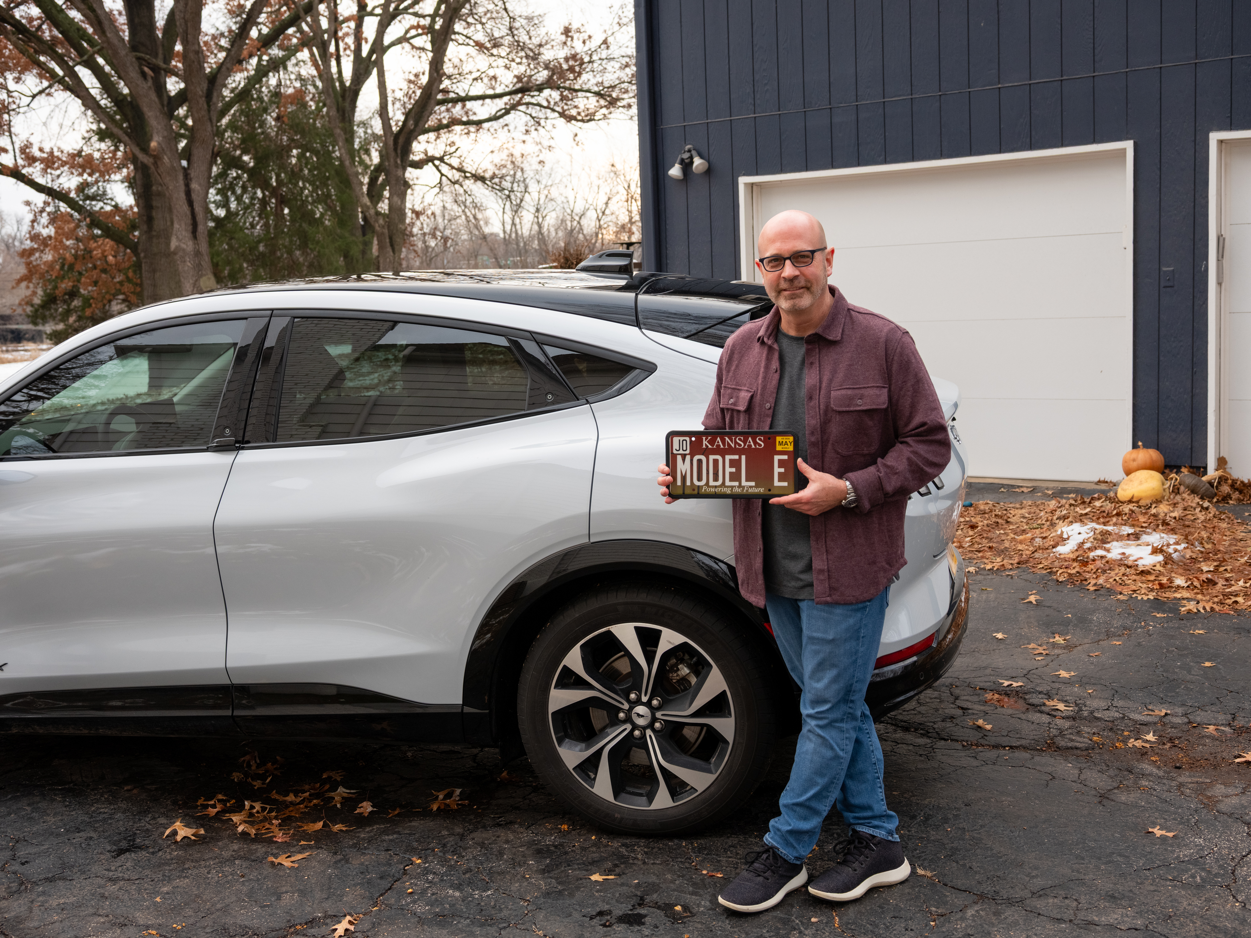 Todd posing with the "Model E" license plate.