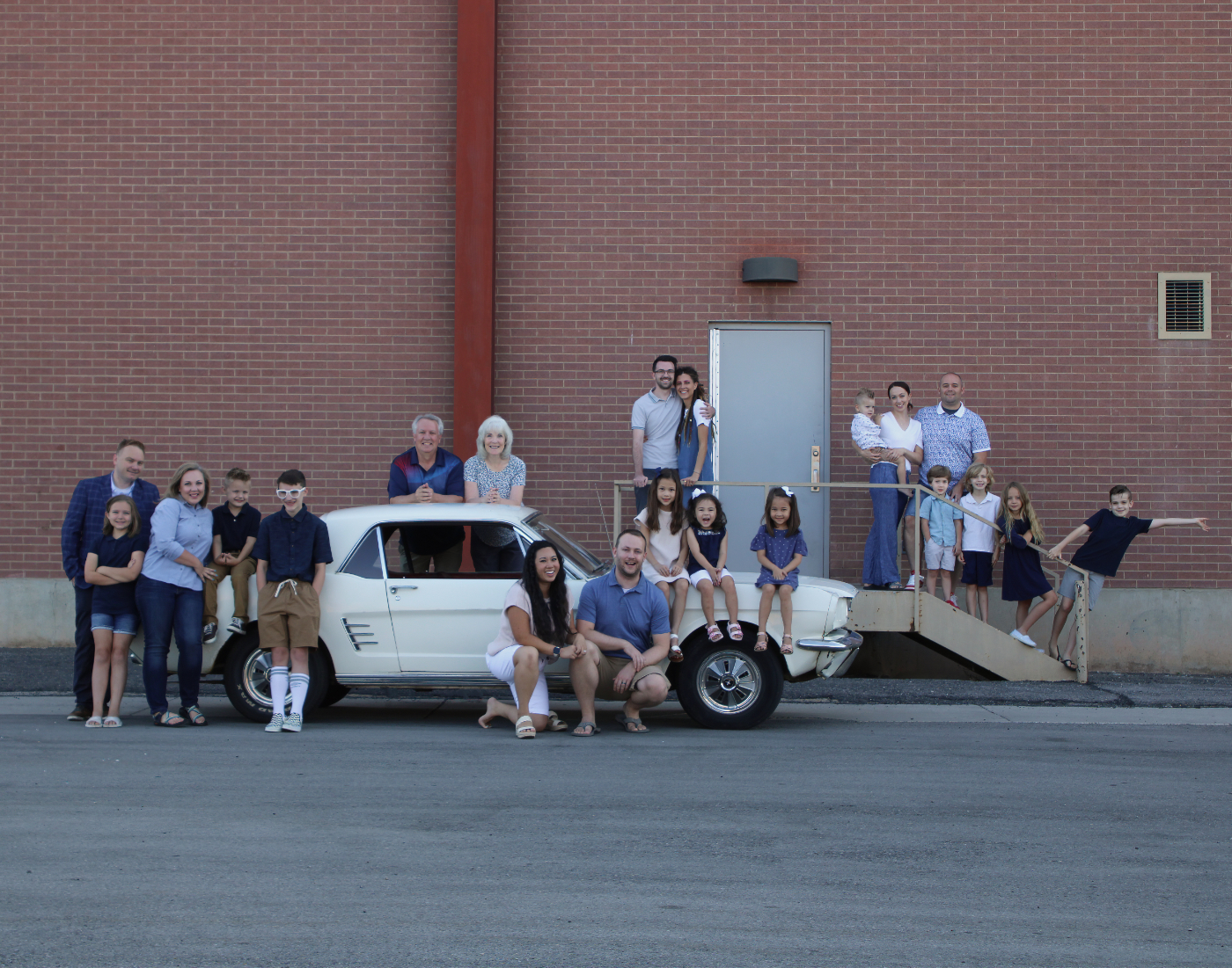 The family Mustang is at the center of each family photo from 1998 to 2025.