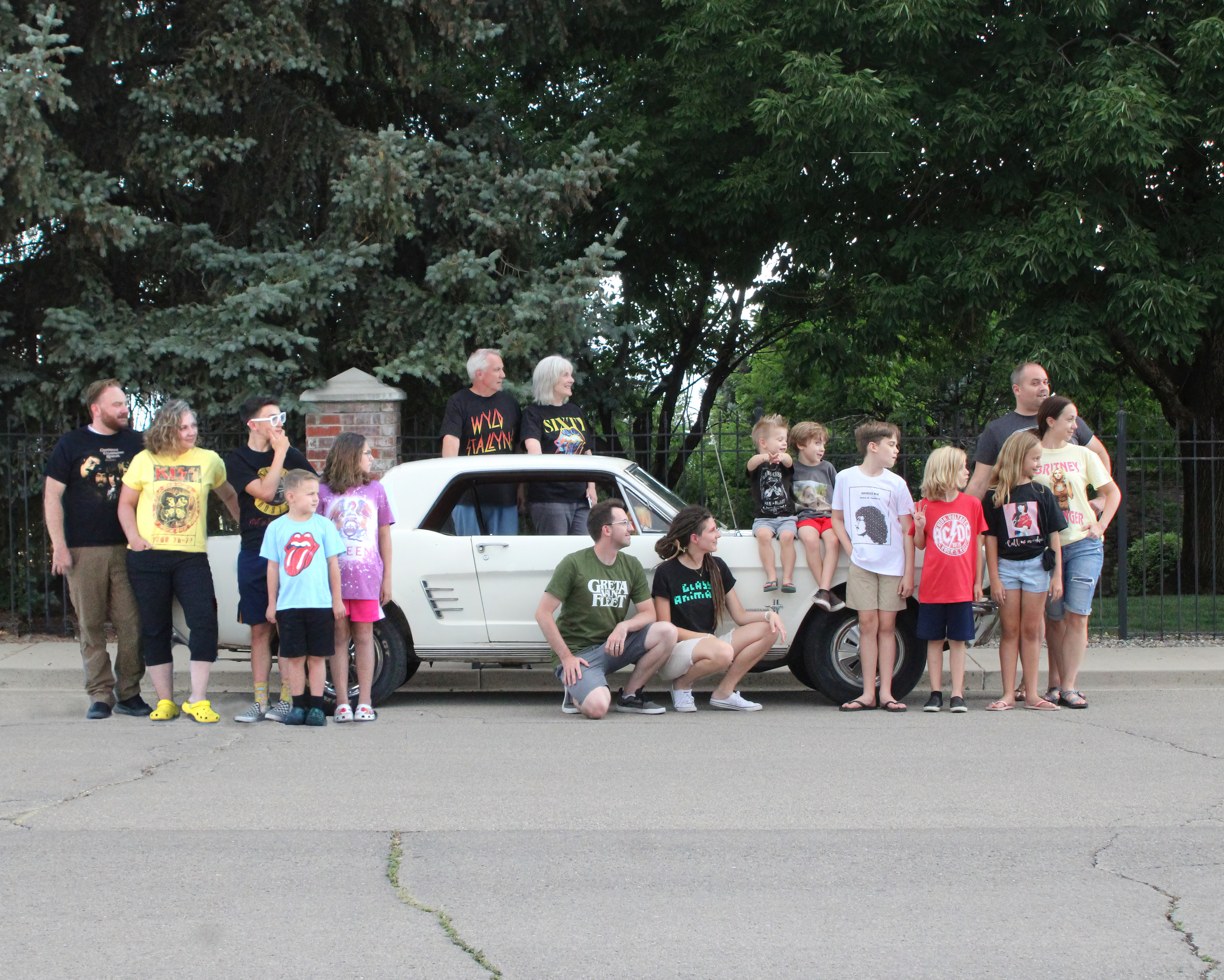 The family Mustang is at the center of each family photo from 1998 to 2025.